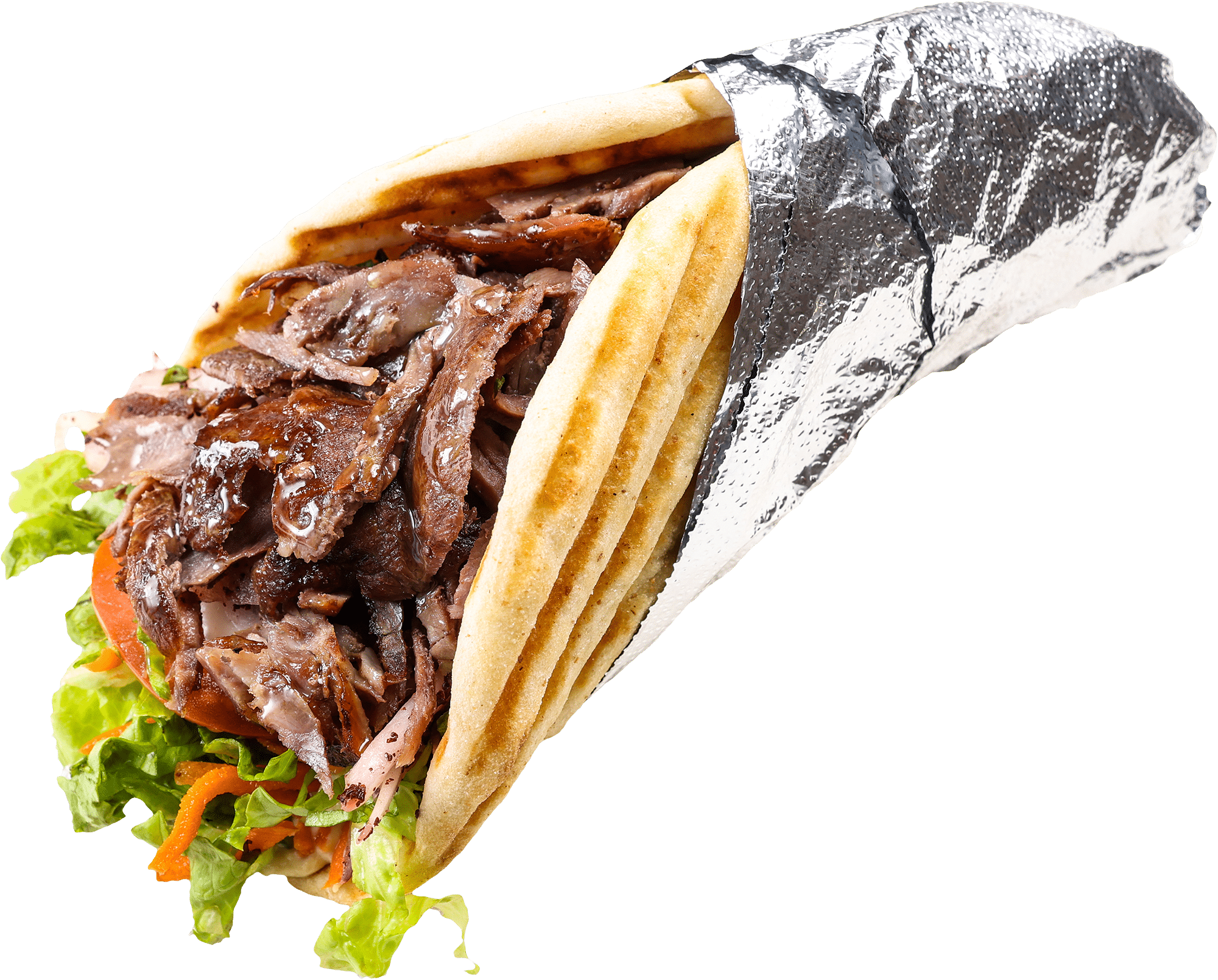 Döner pita sandwich with grilled pita, hummus, and fresh vegetables