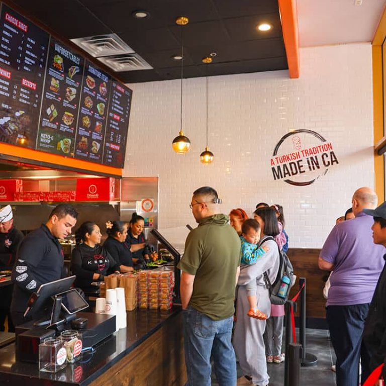 Customers waiting in line at donerg